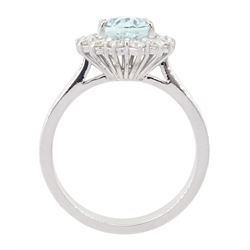 18ct white gold oval cut aquamarine and round brilliant cut diamond cluster ring, hallmarked, aquamarine approx 1.65, total diamond weight approx 0.45 carat