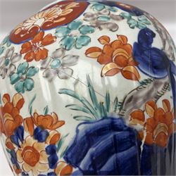 Early 20th century Japanese Imari pattern charger with scalloped rim, together with a Japanese Imari pattern jar and cover, decorated with birds amongst flowers, jar with cover H44.5cm
