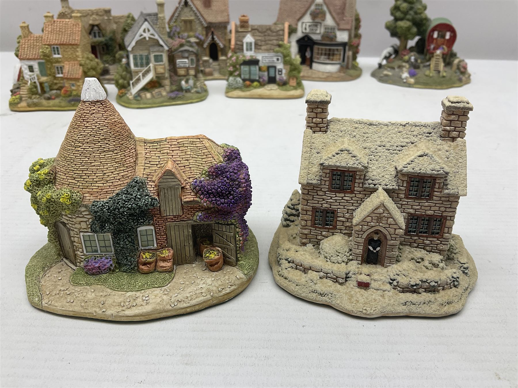 Twenty Lilliput Lanes, including The Right Note, Chatterbox Corner, Whistle Stop Gate, New Neighbours, Travellers Rest etc, all in original boxes