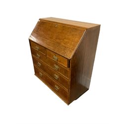 George III oak bureau, fall-front enclosing fitted interior with central cupboard and two correspondence drawers, fitted with two short over three long graduating drawers with cock-beaded facias