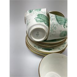 Victorian tea wares, comprising twelve teacups and twelve saucers, twelve side plates, one larger plate, and milk jug, with transfer printed marine botanical decoration in green, with printed registration lozenge mark beneath. 