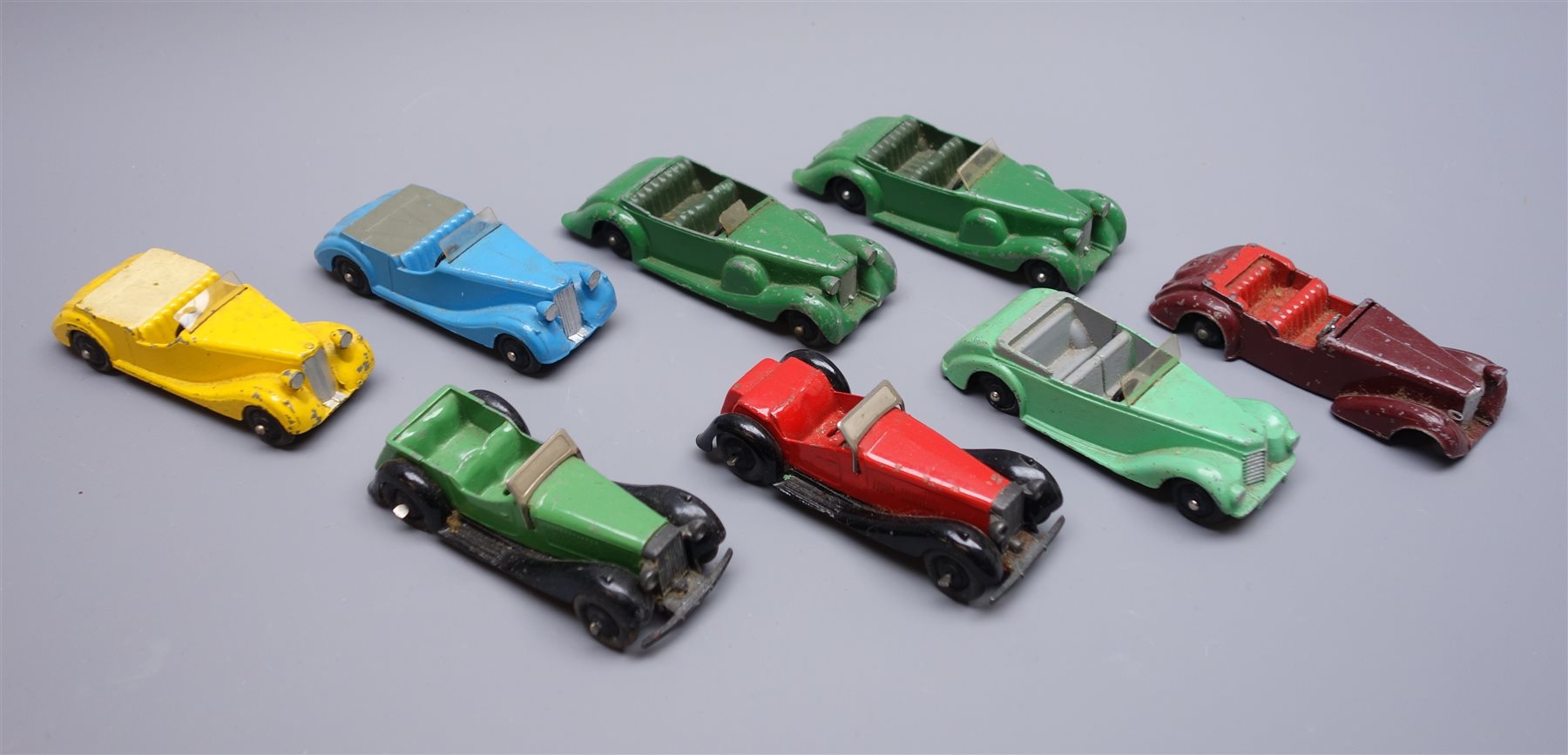 Dinky - eight unboxed and playworn early die-cast models of open ...
