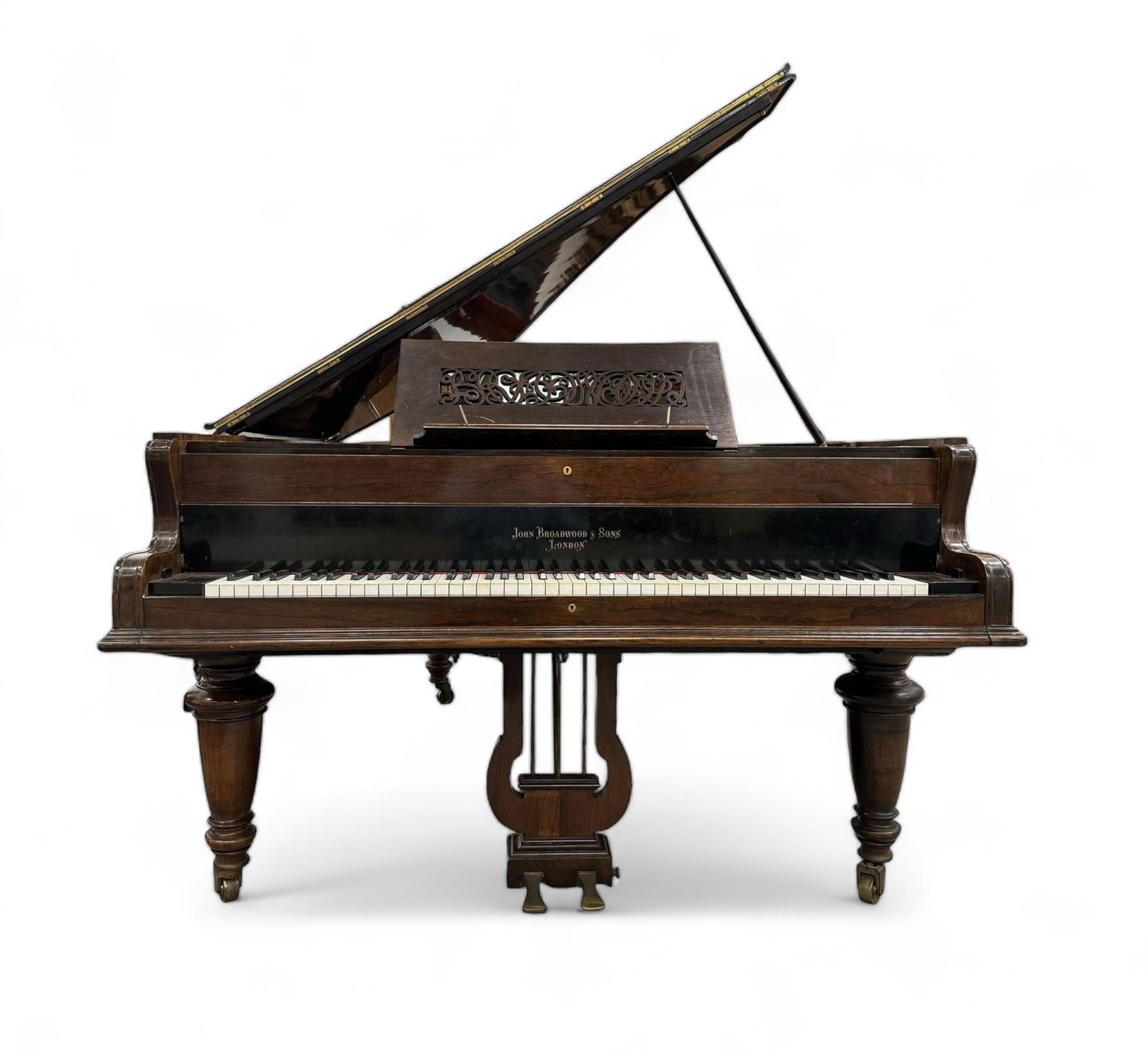 John Broadwood & Sons London - 19th century rosewood grand piano serial  No 47356 (1900-1910) overstrung cast iron frame with 88 notes, 7 octaves, Lyre with sostenuto and una-corda pedals, split-hinged key fall board and fretted music desk, case raised on three taper turned legs with brass castors, original stringing, felt, hammers, dampers and grand roller action.

This item has been registered for sale under Section 10 of the APHA Ivory Act