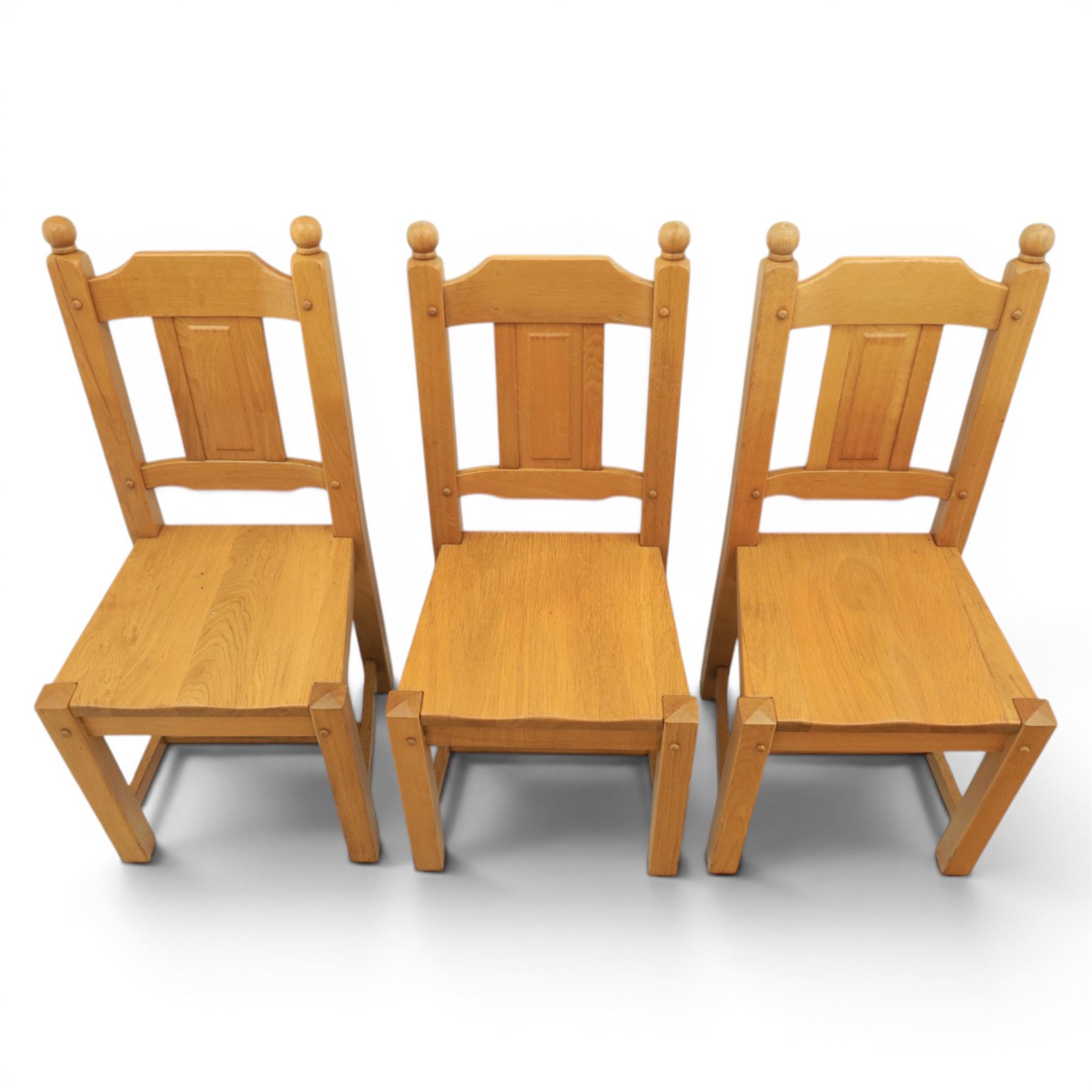Contemporary solid oak dining table, and set of eight chairs, rectangular plank top with chamfered edges, raised on square supports