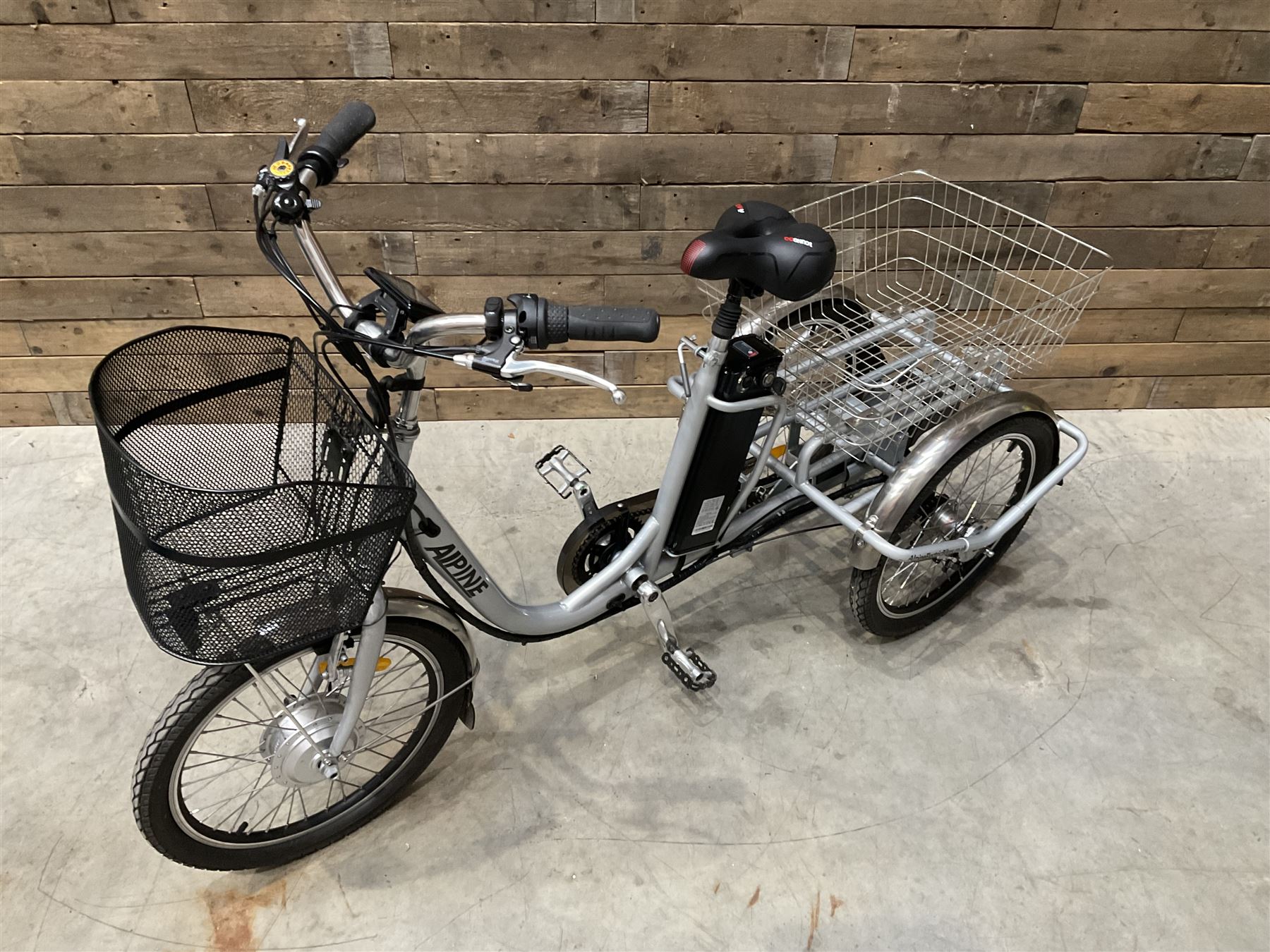 Alpine electric tilt trike - power assisted with throttle (no need to pedal), 15.5mph with 40 mile range, only 37 miles from new, silver finish, removable battery with charger, YoungDo gell seat with cover, £2749 new.