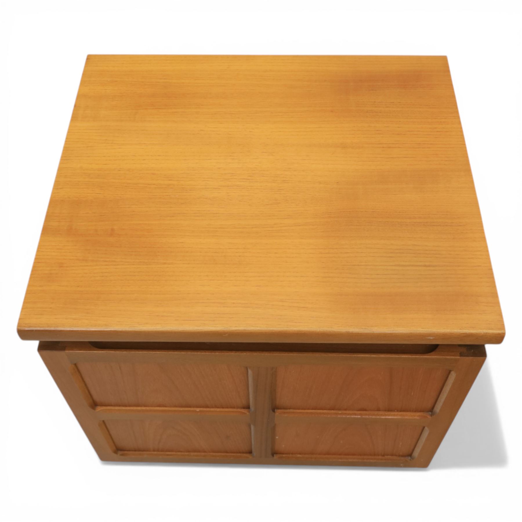 Nathan - teak sideboard and lamp table, both with signature square panelling, raised on a recessed plinth base (Lamp table H 51cm, D 46cm, W 52cm)