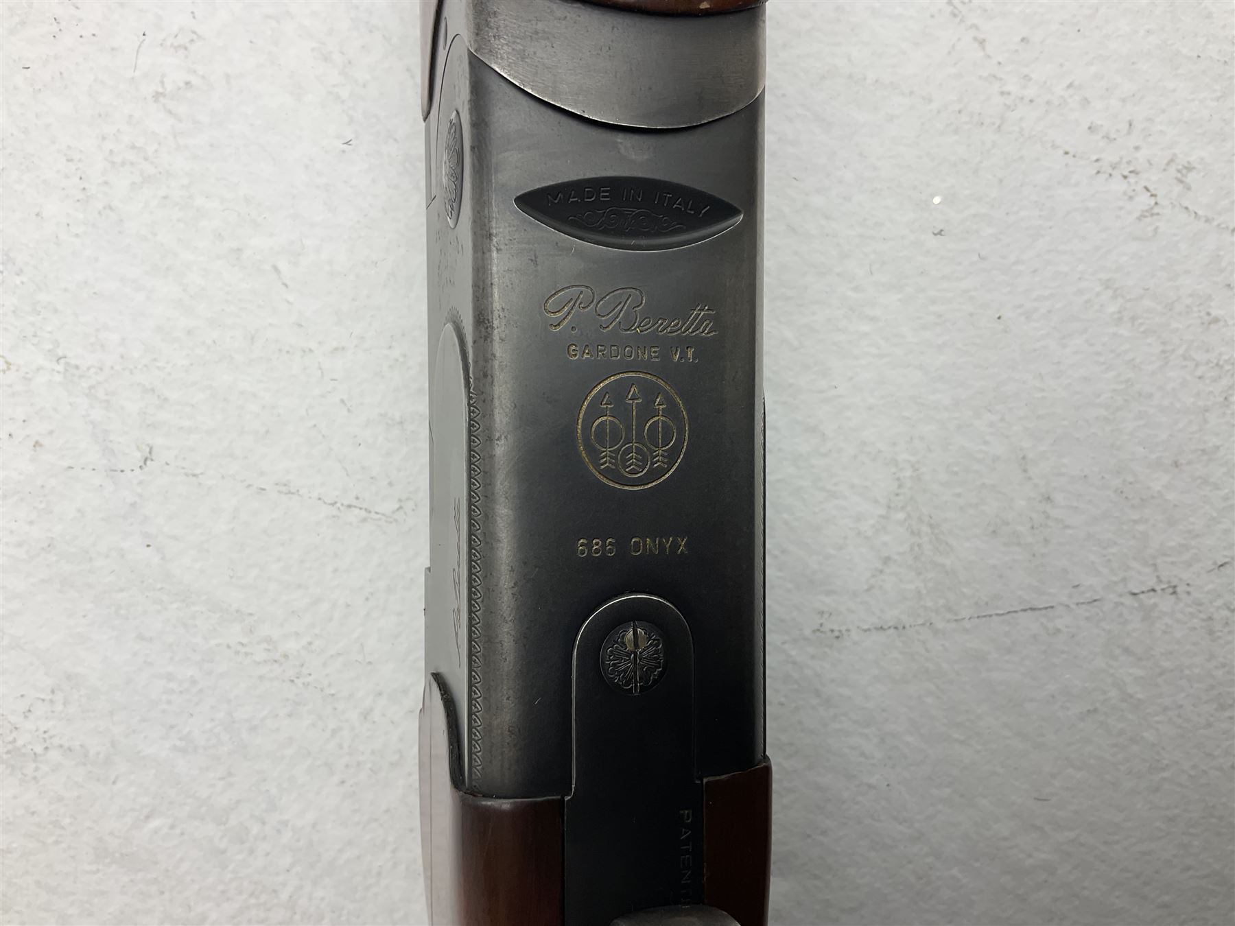 Italian Beretta Model 686 Onyx 12-bore double barrel over-and-under boxlock ejector shotgun, the 74.5cm barrels with ventilated top rib, walnut stock with chequered pistol grip and fore-end, single selective trigger Fore-end no.38044 Barrels no.5314 Action no.F38044B; together with set of five chokes (two fitted) SHOTGUN CERTIFICATE REQUIRED