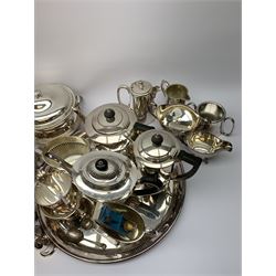 Mappin & Webb Art Deco style four-piece silver-plated tea set, a Mappin & Webb three-piece Princes Plate tea set of half fluted form with engraved monogram, two silver-plated entree dishes, circular tea tray, part cruets and other plated wares 