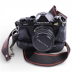 Pair of Tasco 10x50 binoculars, Pentax MV camera, four camera lenses and accessories