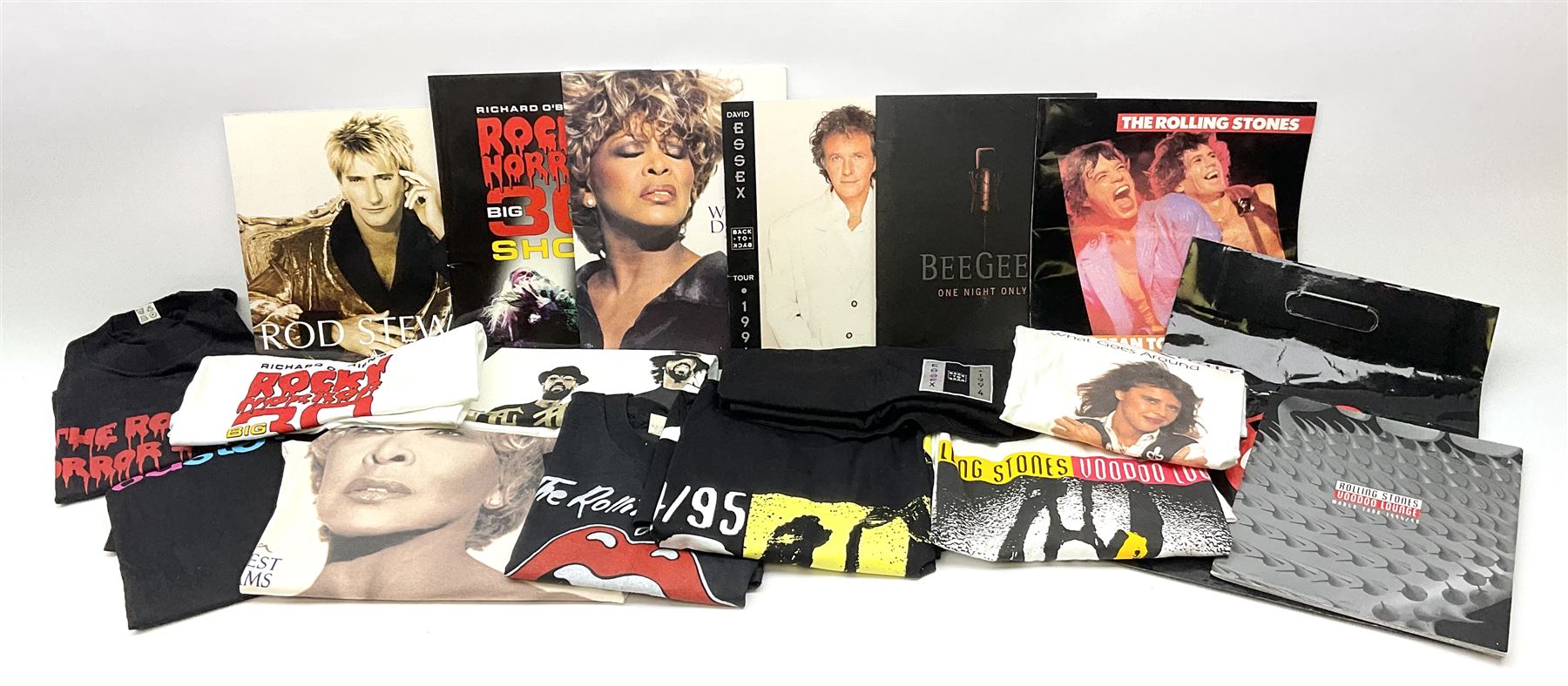 Pop Tour memorabilia - Rolling Stones European Tour 1982 programme and T-shirt; Rolling Stones Voodoo Lounge 1994/5 programme, two T-shirts and carry bag; Rocky Horror Big 30 Pearl Anniversary Tour programme with two T-shirts; Rod Stewart Spanner in the Works programme and T-shirt; Tina Turner Wildest Dreams World Tour 1996 programme and T-shirt; David Essex Back to Back Tour 1994 programme and T-shirt; Bee Gees One Night Only programme and T-shirt; and Suzi Quattro Greatest and Latest T-shirt; predominantly XL size