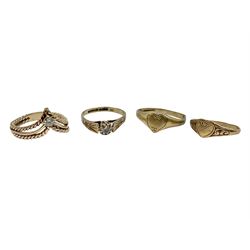Four 9ct gold rings, to include cubic zirconia wishbone ring, single stone cubic zirconia ring and two heart design signet rings