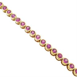 9ct gold garnet bracelet, bezel set with forty-four round cut garnets, hallmarked