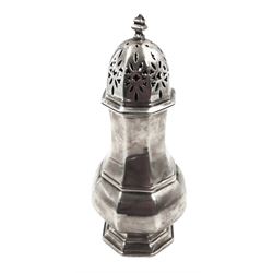 1920s silver sugar caster, of octagonal faceted form, the removable pierced cover with stepped finial, upon a conforming octagonal stepped foot, hallmarked William Greenwood & Sons, probably Birmingham 1925, H16cm