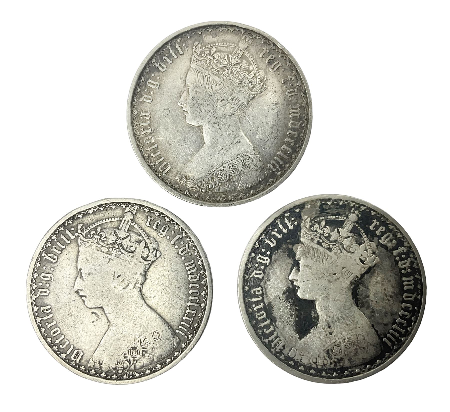 Three Queen Victoria silver 'Gothic' florin coins, dated two 1853 and 1873