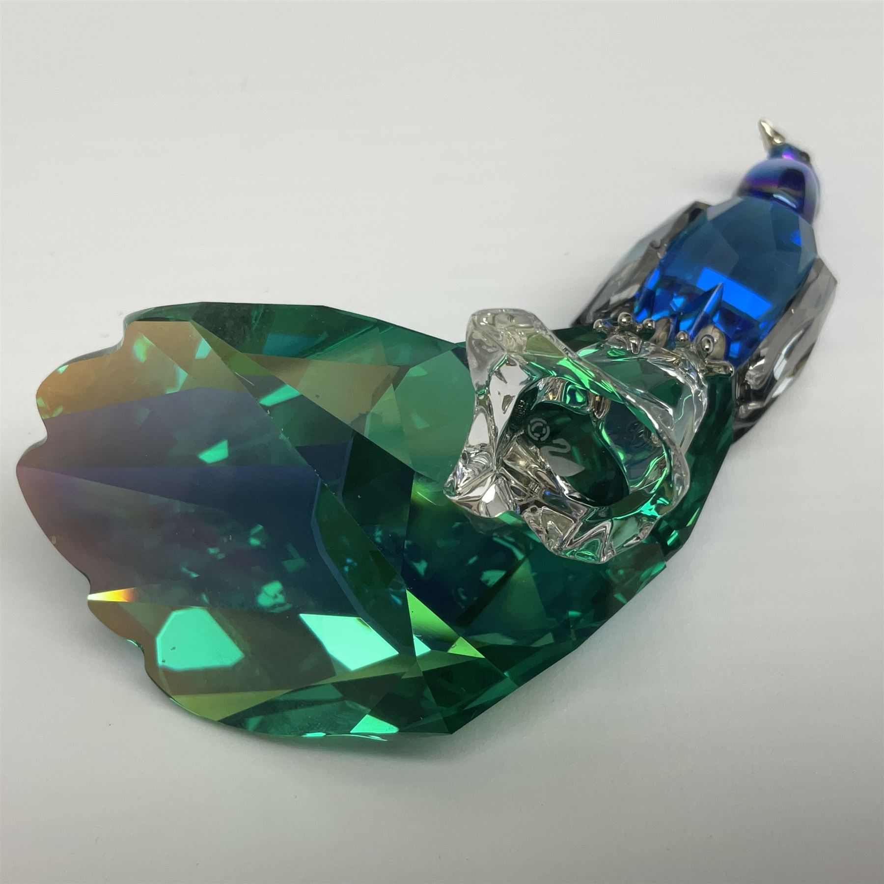 Swarovski Crystal SCS Edition peacock, Arya, together with a Swarovski Crystal peacock, perched on rock and small Swarovski Crystal sign, with peacock motif, tallest H11cm