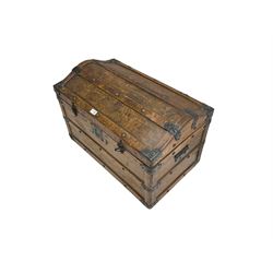 Late 19th to early 20th century oak framed travelling trunk, dome top with iron fittings and panelled sides and top, interior labelled 'The Anchor Patent Waterproof Travelling Trunk - 1902'