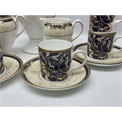 Wedgwood Cornucopia coffee service for six, comprising coffee pot, milk jug, twin handled covered sucrier, coffee cans and saucers