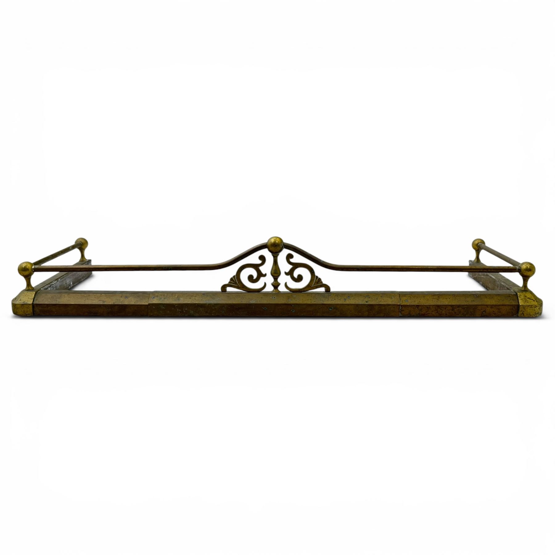 Three 20th century brass fenders, two with pierced Art & Crafts design rails, largest W156cm, D 45cm 