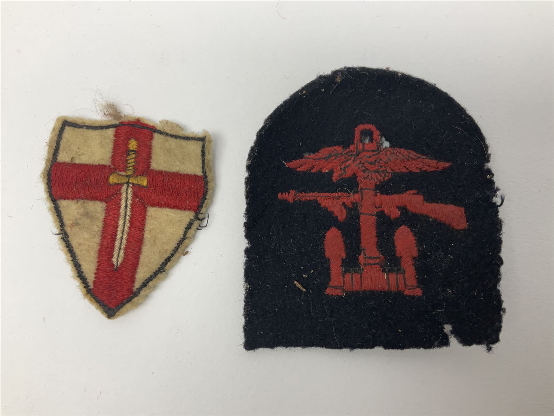 WW1 Short & Mason Ltd 'The Magnapole' black japanned brass field compass in leather carrying case; WW1 trench art paper knife inscribed Dixmude; and small quantity of cloth badges etc