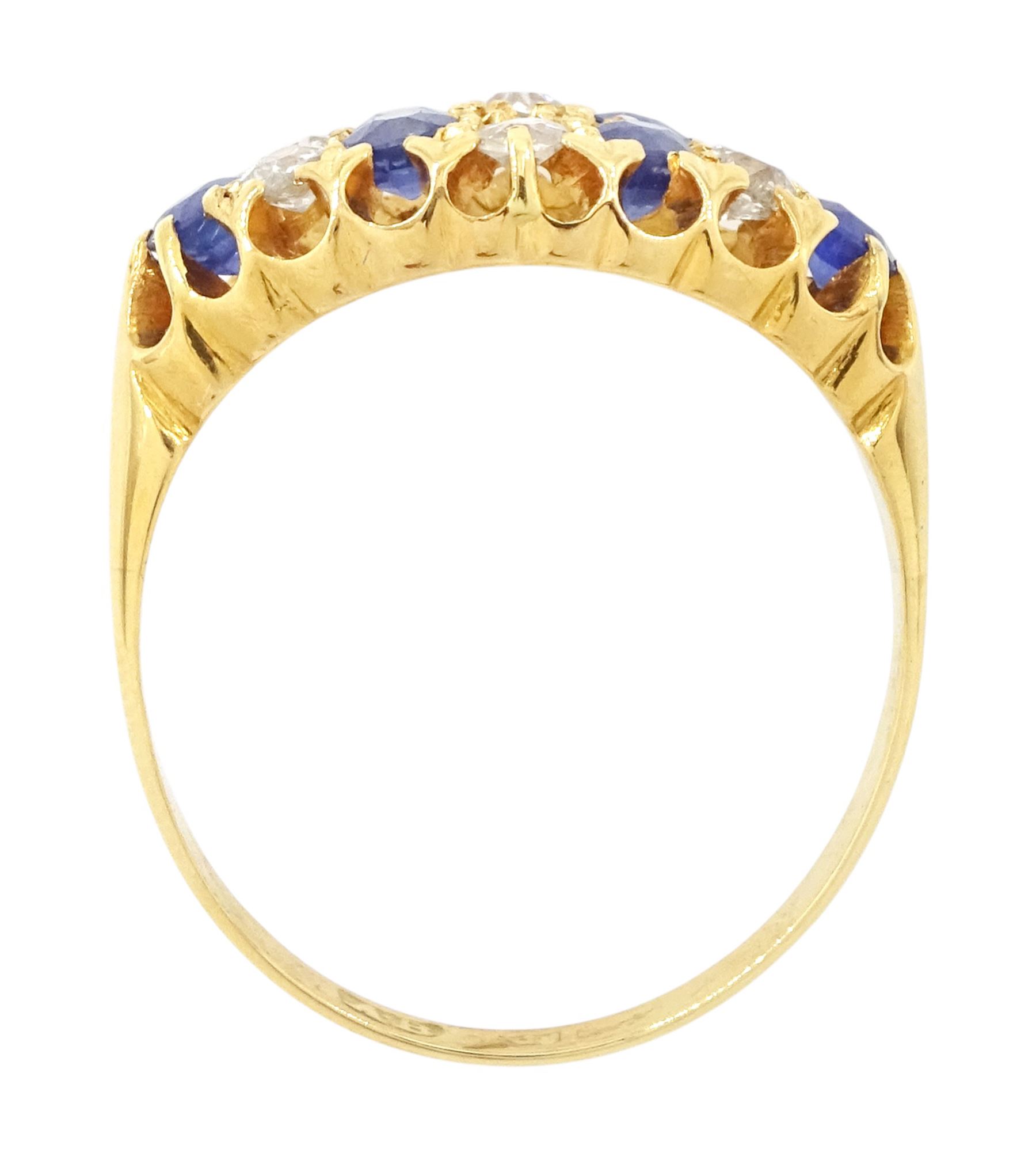 19th / early 20th century 18ct gold diamond and sapphire ring, three rows of old cut diamonds, each spaced by round cut sapphires, total diamond weight approx 0.50 carat