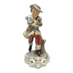 Royal Crown Derby figurine, Winter, modelled as a man with crossed arms on ice skates, by M. Townsend, with printed marks beneath, H24cm