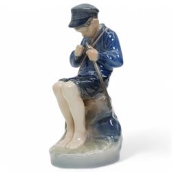 Four Royal Copenhagen figures, including Amager Girl Sewing no. 1314, Boy Whittling no. 905, Girl with Goose no. 528, and Amager Girls Reading no. 1395