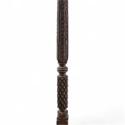 Late 20th century carved mahogany torchère stand, dished top above heavily carved column, with turned elements on moulded square base upon bun feet
