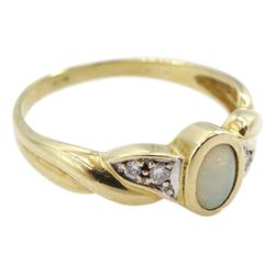 9ct gold bezel set opal ring with diamond chip set shoulders