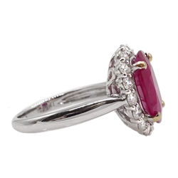  18ct white gold oval ruby and diamond cluster ring, stamped 750, ruby approx 3.80 carat, diamond total weight 0.81 carat  
[image code: 4mc]