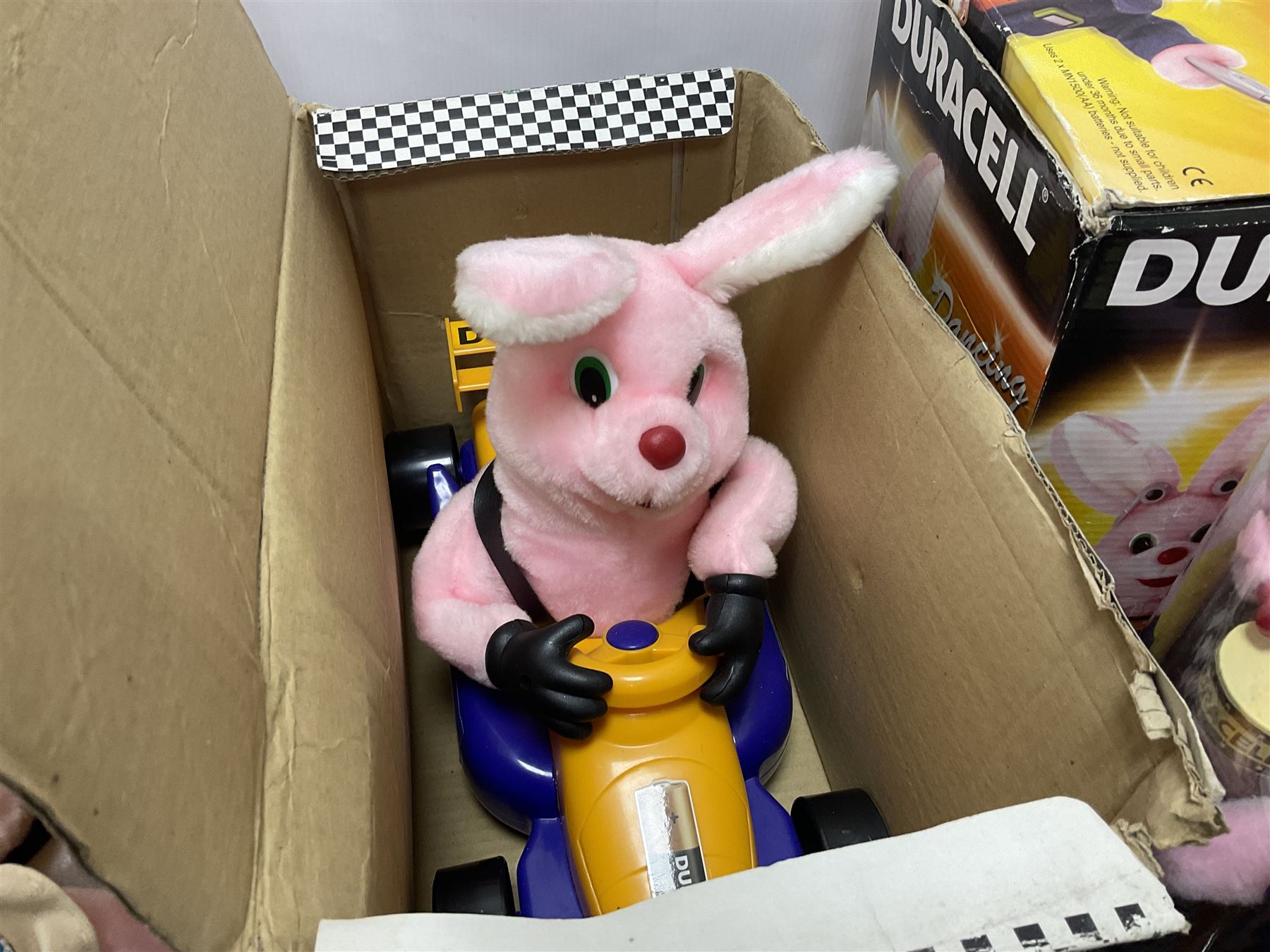Collection of Duracell Bunny collectibles to include Racing Bunny, Fireman Bunny, Dancing Bunny etc in original boxes; Bandai collectable characters, Gremlins 2 Gizmo plushies from Applause, further soft toys and collectables etc, in three boxes 