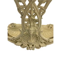 Coalbrookdale style cast iron hallstand, white painted, curved demi-lune form cast with shell motif, scrolls and acanthus leaves