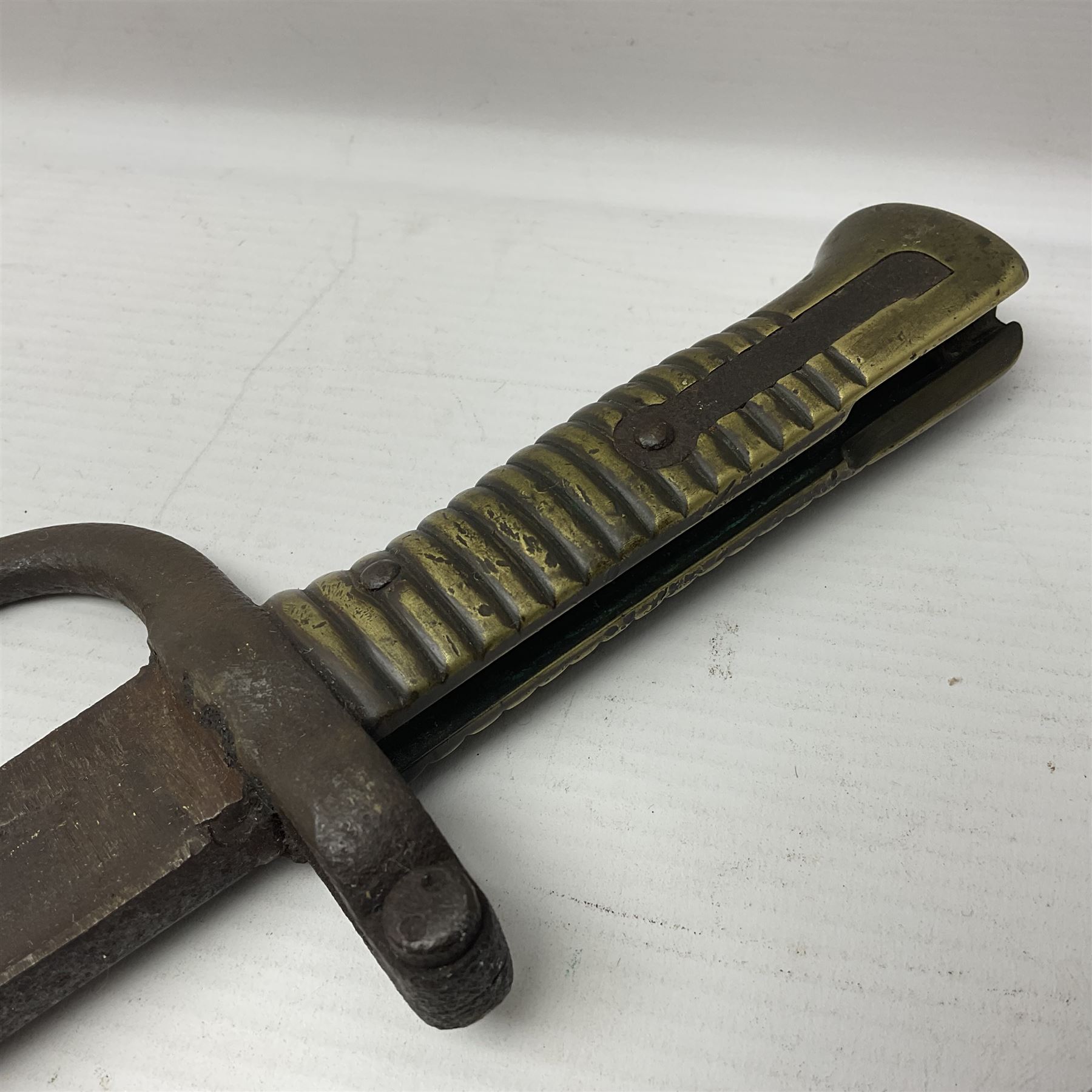 WWI Remington Pattern 1913 bayonet, the 43cm fullered blade with various marks to the ricasso including date code 11 16; in leather covered scabbard with various stamps including JWB 17 L58cm overall; and a French Model 1866 sabre bayonet (no scabbard)