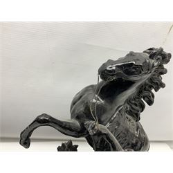 Pair of spelter figural statues of man and rearing horse, height 44cm and 42cm