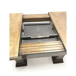 'The Celerity Patent' - Early 20th century oak extending dining table, canted rectangular moulded top with foldout leaf, on two rectangular box supports, 91cm x 122cm - 167cm, H74cm
