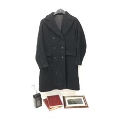 Train driver's black overcoat of double breasted form with six BR buttons, B.R.(E) black painted handlamp with kerosene burner H20cm, two volumes by Edward Cecil Poultney entitled Steam Locomotives c1951 in delivery box with book of coupons and framed photograph of Goole railway Station