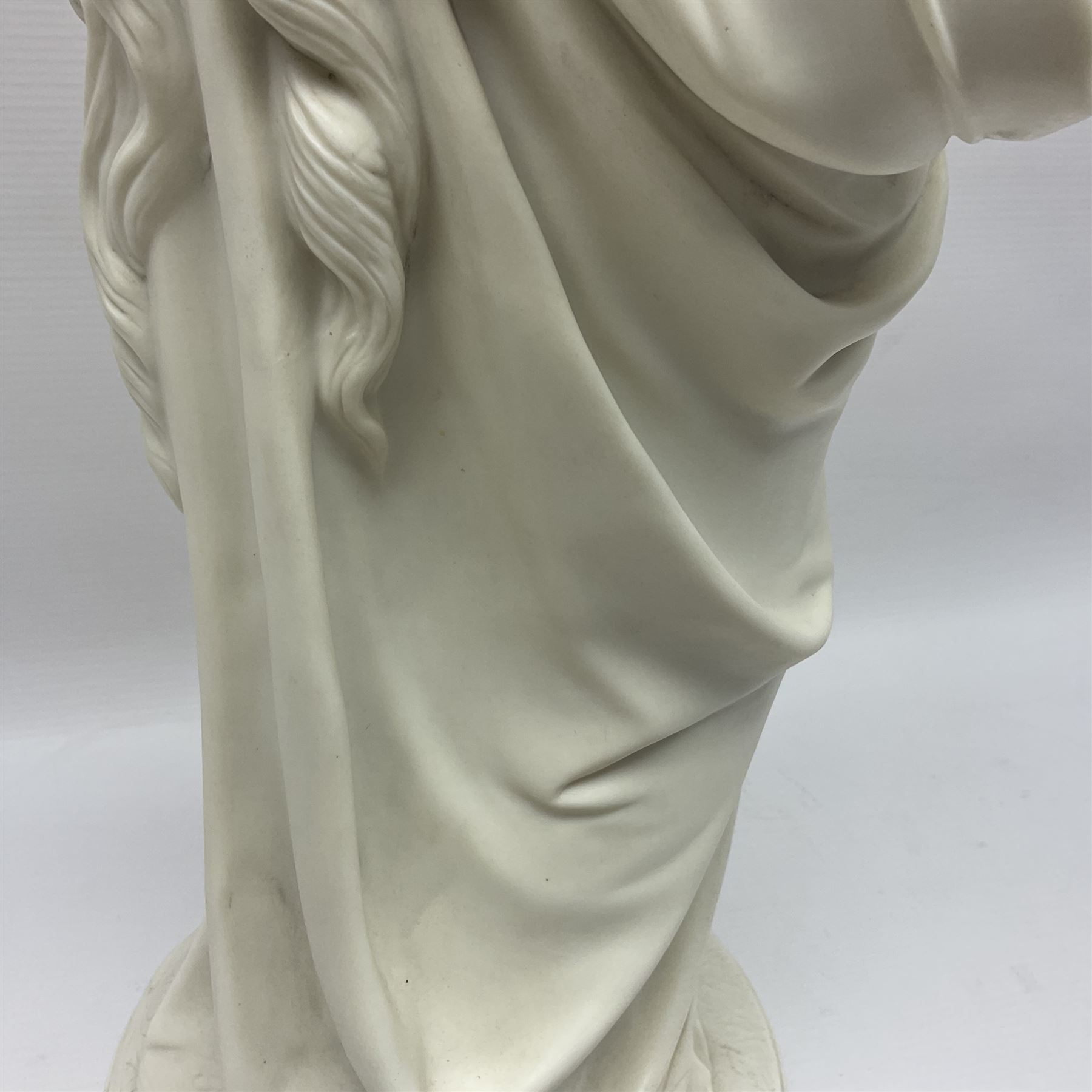 19th century Copeland Parian Ware figure, after R Monti, modelled as Lady Godiva, upon a circular titled plinth, signed and dated verso R Monti 1870, impressed to base Copyright Reserved Copeland, overall H22cm