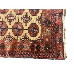 Old Afghan red ground rug, decorated with repeating bird motifs, the guarded border with candelabra pattern (150cm x 104cm); and antique Afghan burnt orange ground rug, field decorated with octagonal lozenges, repeating geometric border (134cm x 95cm) (2)