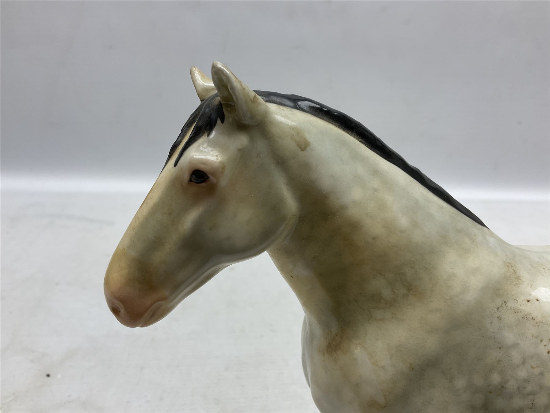 Group of three Beswick Shire horses, comprising CH. Burnham Beauty mare in matte finish, dapple grey horse and bay horse, all with stamped marks beneath