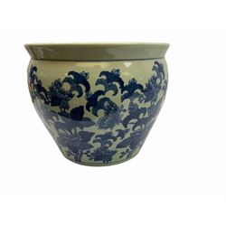 Chinese blue and white jardinière or fish bowl, the exterior decorated with flowers beneath a key fret border, the interior decorated with koi fish, with character mark beneath, H26cm D31cm