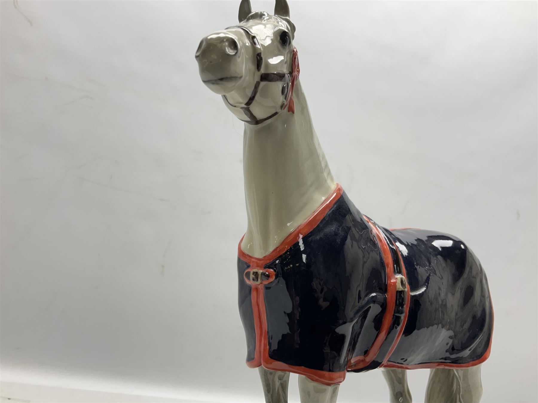 Beswick figure, grey Welsh Mountain Pony in a blue rug on plinth, no A247 H23cm