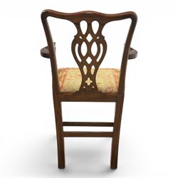 Large 19th century mahogany extending dining table with set of Chippendale design chairs, extending dining table with rectangular moulded top additional three leaves, raised on turned supports terminating in brass castors, the dining chairs (2 + 2) with shaped cresting rail and pierced splats, raised on square supports with stretchers