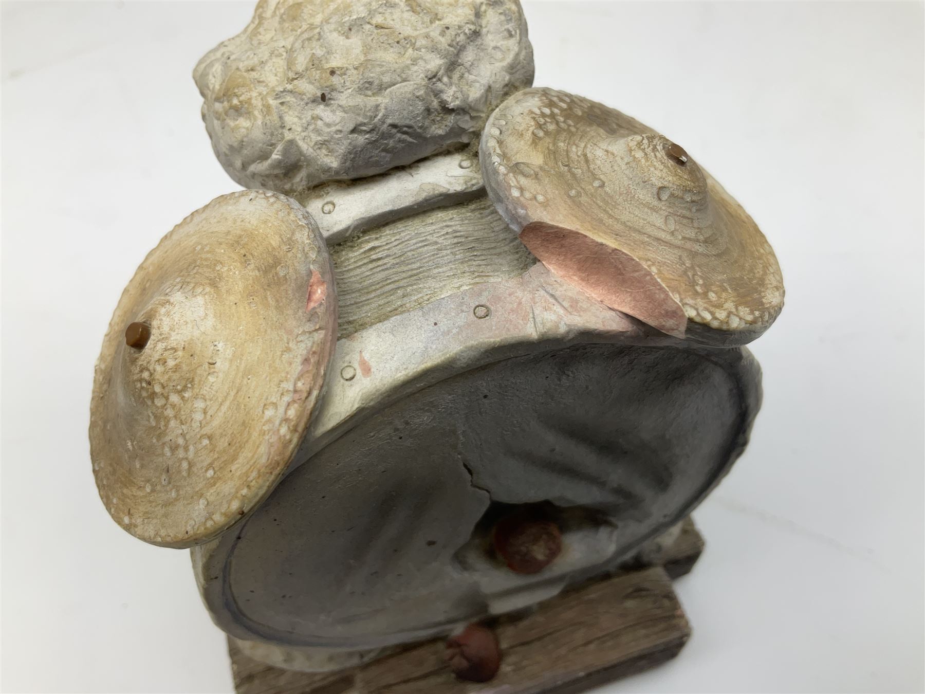 Terry Pratchett Discworld figures, designed by Clarecraft, comprising Lias Bluestone DW82, Hogfather DW72, Granny Weatherwax, boxed, DW06, Ridcully DW61and 'Ironcrust's genuine dwarf bread'.