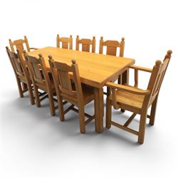 Contemporary solid oak dining table, and set of eight chairs, rectangular plank top with chamfered edges, raised on square supports