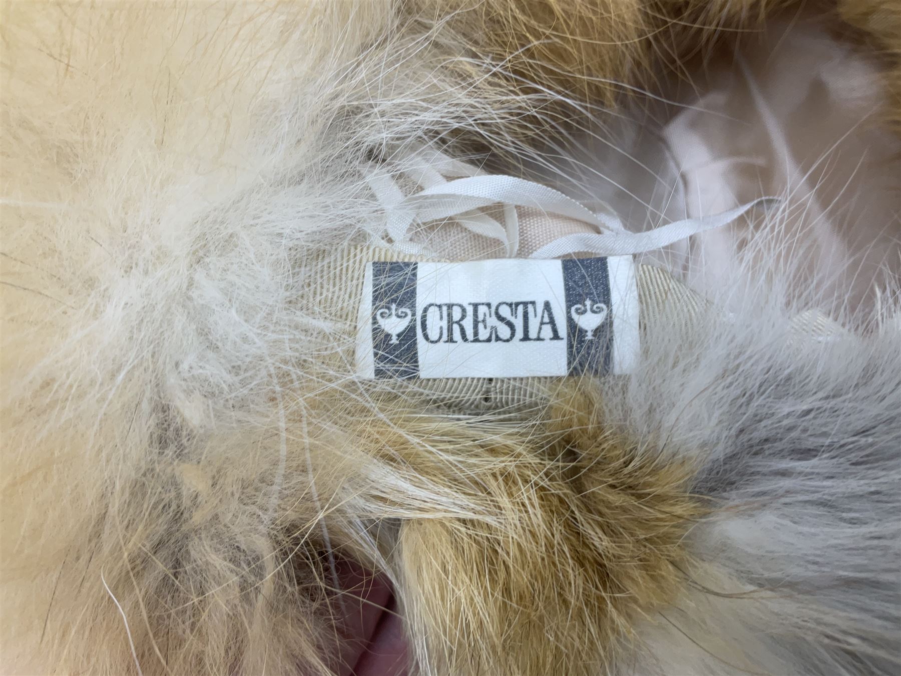 White Saga fox stole, together with Cresta Red fox fur hat, Red fox fur headband, a fur headband and matching cuffs, Harris Tweed clutch bag with fur trim, a fur clutch bag and an Ostrich feather and mohair scarf. 