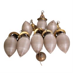 Set of eight French Art Deco Blondel Holophane pendant lights, the glass acorn shades, with pierced brass fittings, shades H35cm