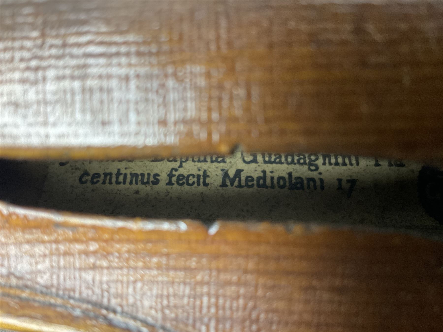 French violin c1900 labelled Guadagnini with 35.5cm two-piece maple back and ribs and spruce top, labelled 'Joannes Baptista Guadagnini Pla Centinus Fecit Mediolani 17**' L59cm overall; in hard carrying case