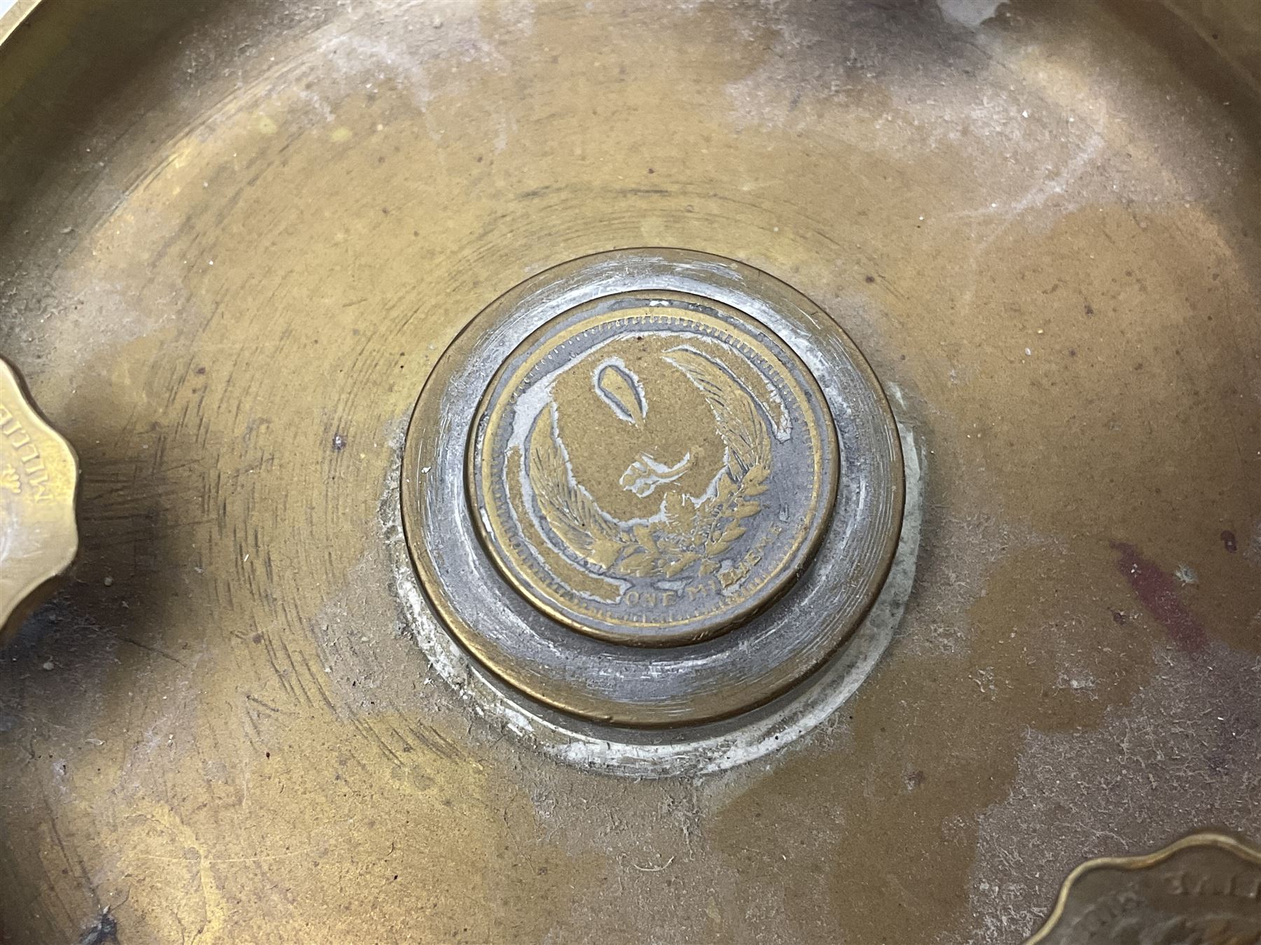Four post-WW2 'silver' medallions of Adolf Hitler/German interest, two depicting Von Hindenburg also; and pair of 1960s trench art shell case bases as ashtrays mounted with Libyan Five Milliemes coins as cigarette rests (6)