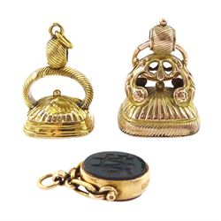 Victorian 15ct gold swivel fob, the agate intaglio depicting a crescent moon above a castle and inscribed 'Noli Me Tangere', the reverse bloodstone monogrammed 'MG', Birmingham, 1890 and two gold-plated carnelian and agate intaglio fobs, all with wax seal impressions