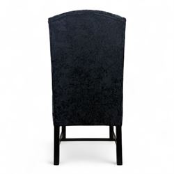Oka - Pair of contemporary upholstered wingback armchairs, in black and blue textured velvet effect fabric, with tall scroll wing sides and square tapered legs joined by stretchers