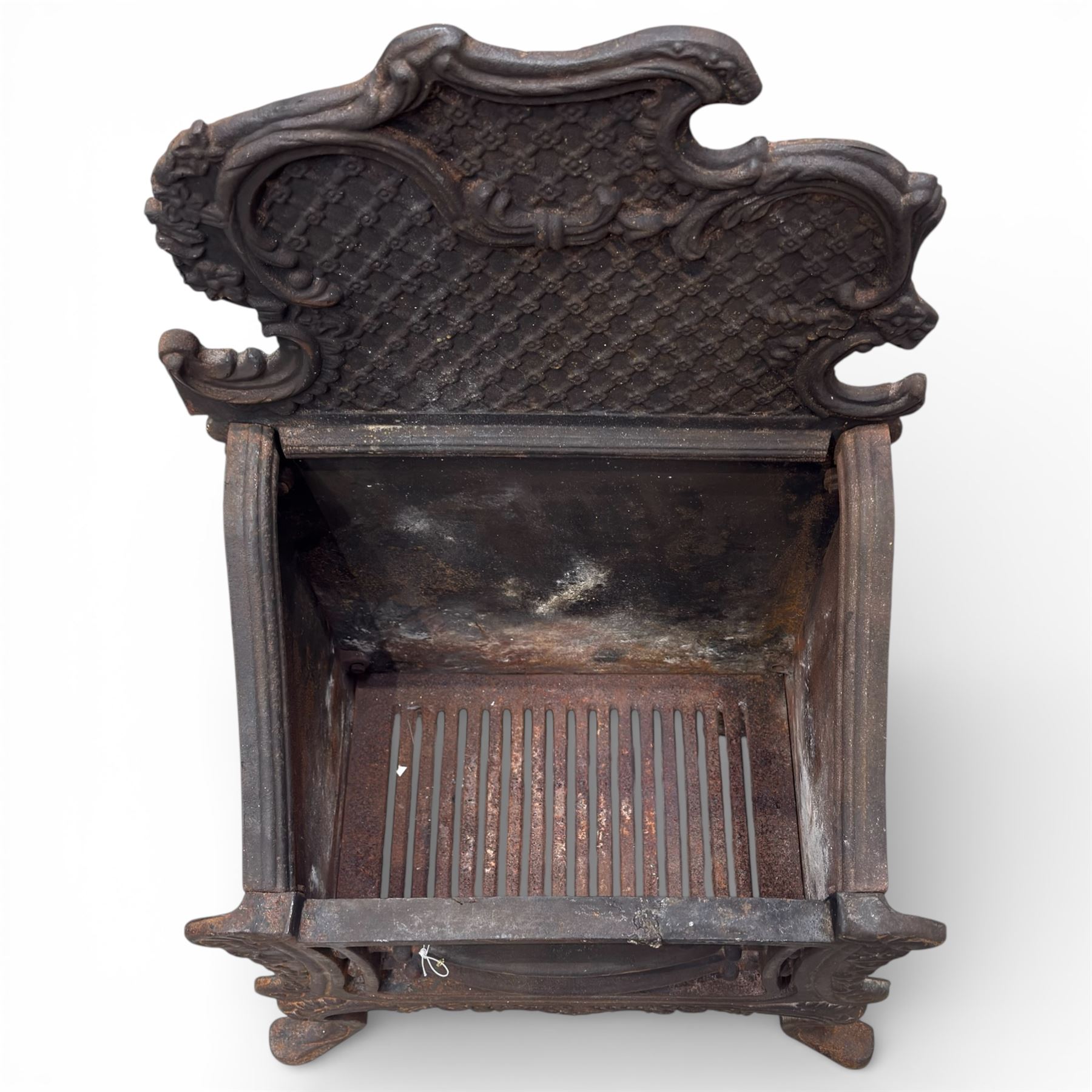 Cast iron fire grate with shaped front cab legs